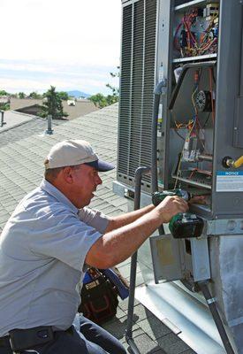 A photo taken during an air conditioning service.