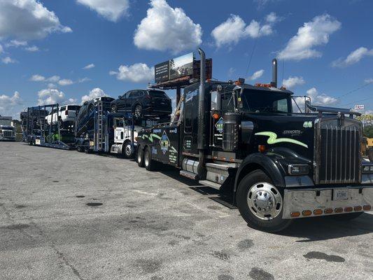 The wrecker towing my truck