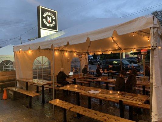 Outdoor seating on a cold wet day