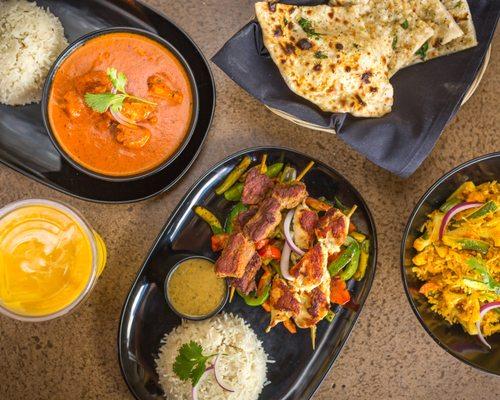 Curries, Kabobs, Biryanis, Garlic Naan and Mango Lassi from Tarka Indian Kitchen!