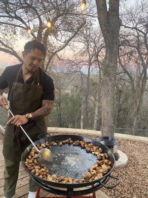 Chef Diego cooking the paella