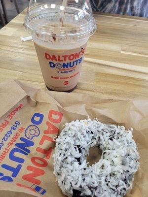 Stoks coffee and a coconut chocolate donut