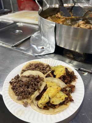 Carne Asada and Al Pastor before adding salsas, onions, cilantro.