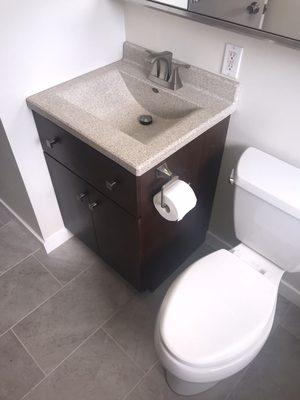 New flooring, vanity and top, toilet, new smooth walls, etc.