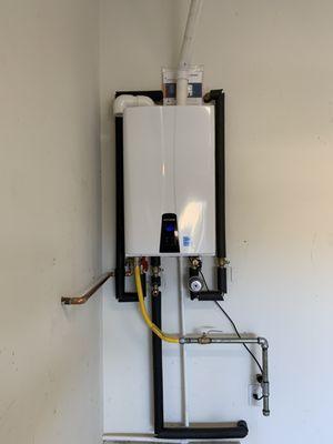 Navien 240A2 with recirculating pump tankless water heater. A retro fit installation form a tank to a tankless water heater.