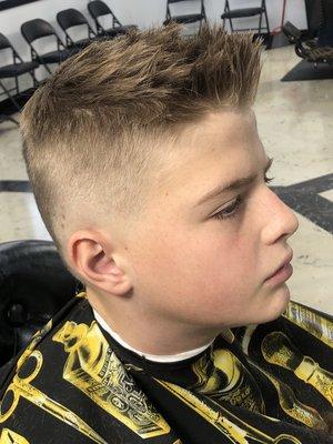 Fresh kid fade with pomp top