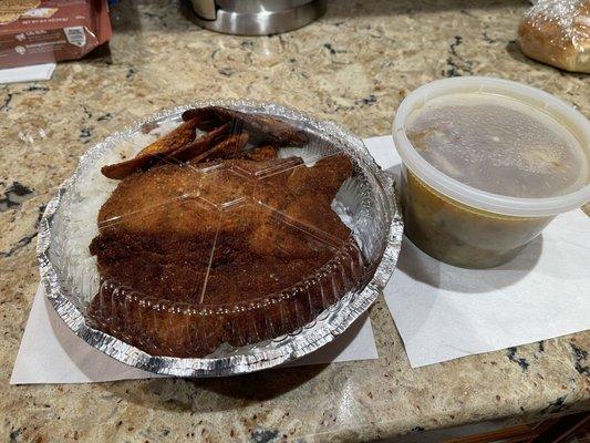 Fried chicken and white rice with meat soup.