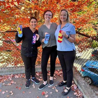 Lakota, Katy and Melinda each got a pair of Winnie the Poof themed socks from a loving fan.