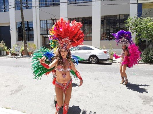 Samba dancers from Samba Conmigo celebrate Carnaval with Mission Food Hub volunteers on a special Sunday edition, May 24, 2020.