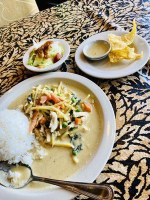 Green chicken curry with small salad (ginger dressing) and fried wontons.