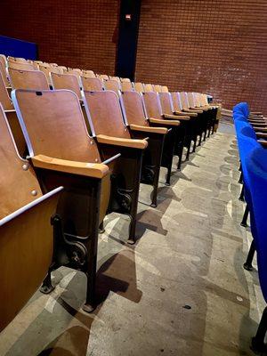 07.22.23 no cushion wooden seats on the second half of the theatre