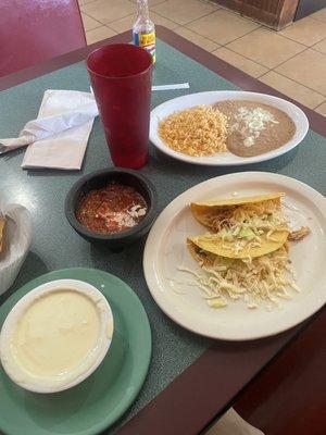 Two tacos rice and beans lunch special $6.99