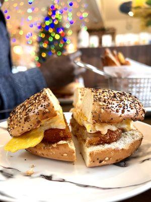 Breakfast sandwich on bagel and hash brown (get the sunflower sauce!)