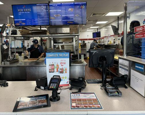 Domino's staff working to get those delicious pizzas out to the customers