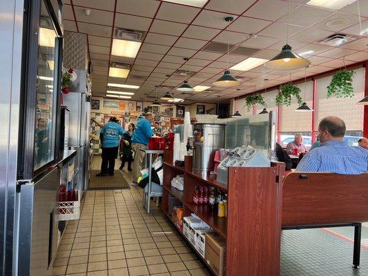 Busy little bees behind the counter.