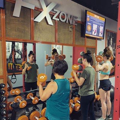 Family working out in the FX Zone