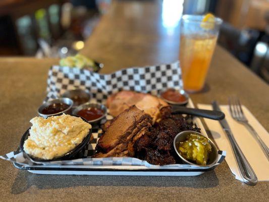 Gut buster brisket turkey burnt ends grits and pickles.