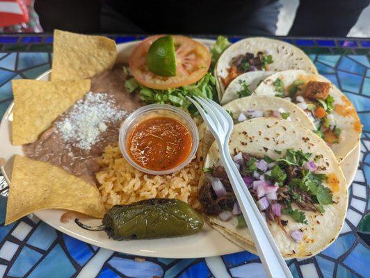 Barbacoa and chicharrone tacos