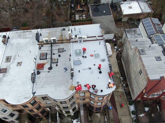 New white SBS flat roof membrane installed in building in Park Slope, Brooklyn NY.