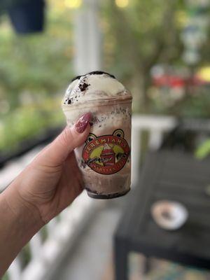 Cookies and cream Italian ice with chocolate and vanilla swirl soft serve