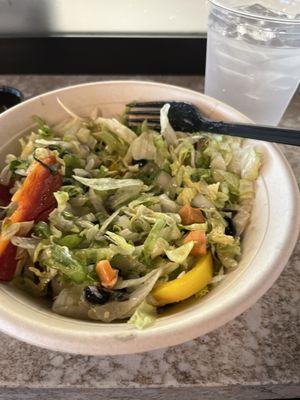 Limp lettuce tiny uncooked sweet potato pieces a few beans