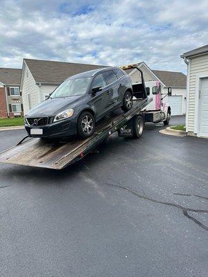 SUV being loaded in tight condo parking lot