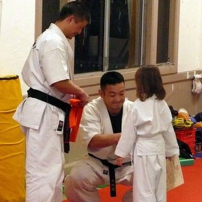 Sensei Awarding the Orange Belt