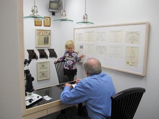 Marty Mease helps his youngest customers in the lab.