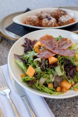 Mediterranean salad and crispy arancini