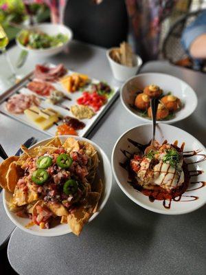 Left to right - pita nachos, meat and cheese board, Risotto balls and meatballs