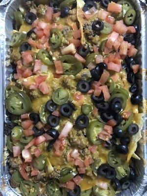 Nacho Supremo - can't really get to the nachos though because they're buried under all of these toppings, which makes them soggy.