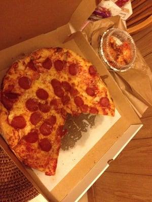 Pepperoni pizza and wings.