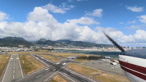 Takeoff from Honolulu International Airport. The weather is always beautiful for tours and student pilots.