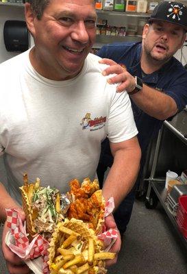 Chef Brian Duffy checking out Buzzy's three different Meat Cones...Fried Chicken, Pulled Pork, and Philly Steak.