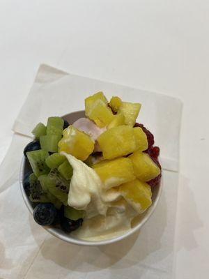 Size small, Pomegranite AND Mango frozen yogurt, with up to 4 toppings, Total w/tax $7.50.  Refreshing!