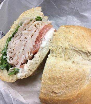 Small Turkey with lettuce, tomato and mayo. Delicious!