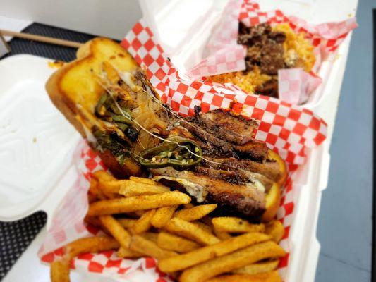 Brisket sandwich with seasoned fries