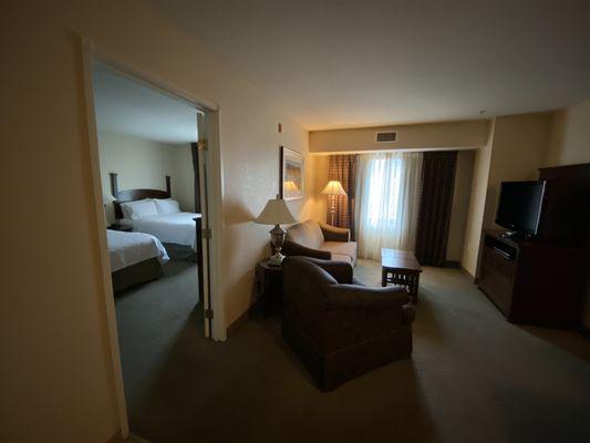 One side of our suite for one night with pets! (7/31/22)... each bedroom has a separate bathroom