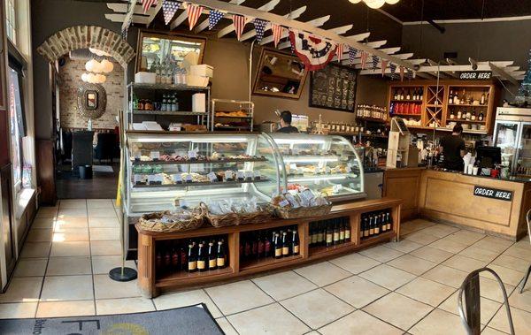 Pastry display and coffee bar.