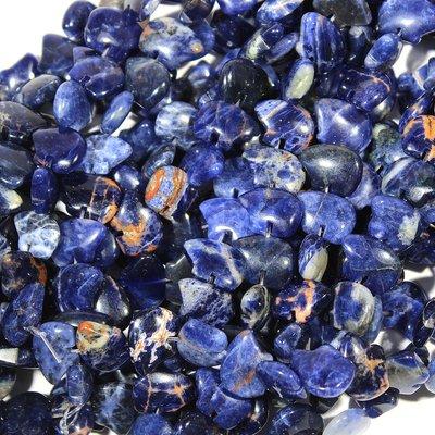 Orange Sodalite out of South Africa! Carved in to beautiful bears! Available online and in store!