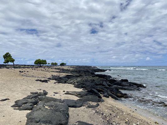 The sandy and rocky beach of Kekaha Kai (Kona Coast) State Park