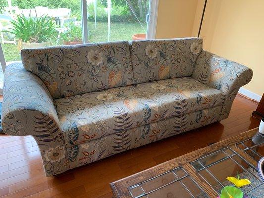 This used to be a very faded print couch. He made the back cushions totally from scratch since the original couch had removable cushions