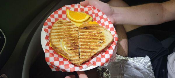 Heart-shaped vegan chicken patty sandwich