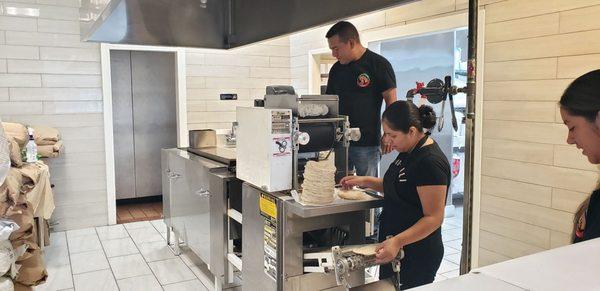 Making fresh corn tortillas