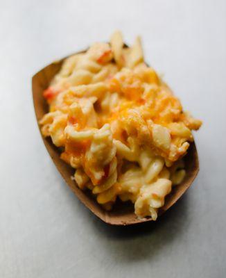 Pimento mac & cheese. The one that made us famous with the college students, but everyone loves it! Creamy, with an unexpected flavor punch