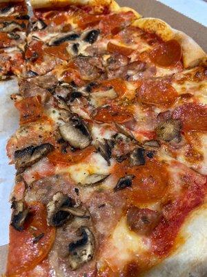 Large pizza with pepperoni and mushroom