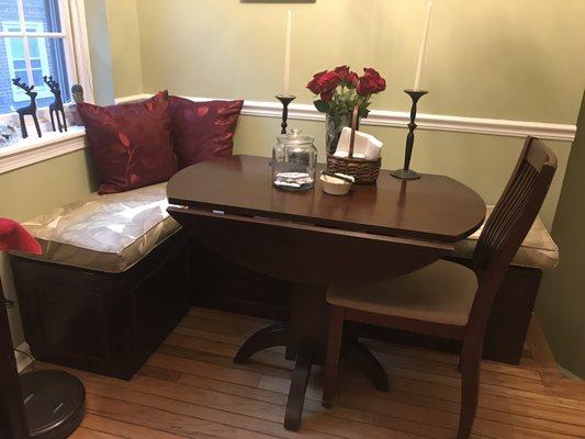 A full view of the dining room area.  The banquette cushions (sage and white) were made by Solano's