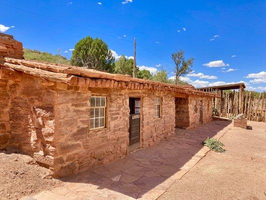 Cabin and corral in background