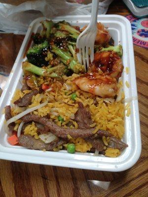 Beef fried rice with shrimp and broccoli in garlic sauce. Love this place.