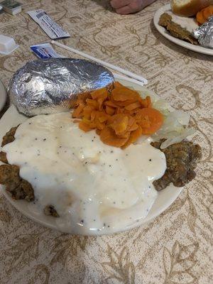 Lunch buffet. Chicken Fried Steak, veggies, salad bar, dessert, drink for $12.98. Can't beat that deal!